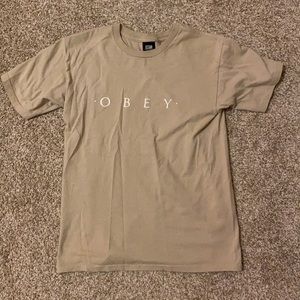 beige obey t shirt
